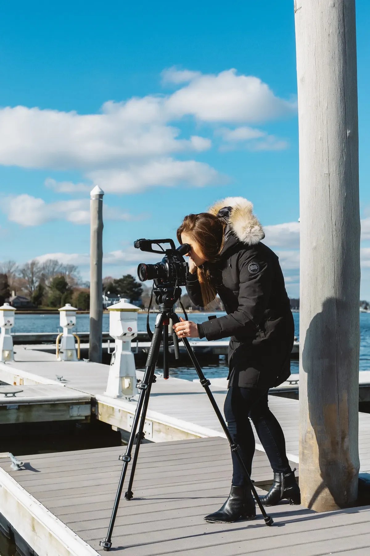 Willa Kammerer filming on a dock — the early Firestarter Interactive years